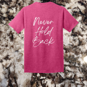 Inspirational 'Never Hold Back' quote in white on the back of a heather sangria t-shir